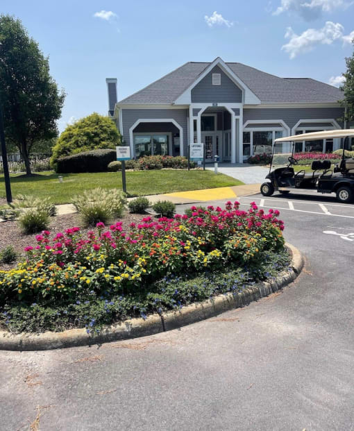 a house with a golf cart parked in front of it