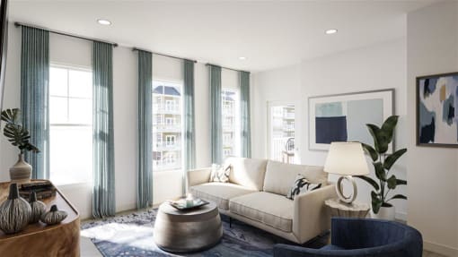 a living room with a couch and a table at The Port at East Beach Apartments and Marina, Virginia, 23518