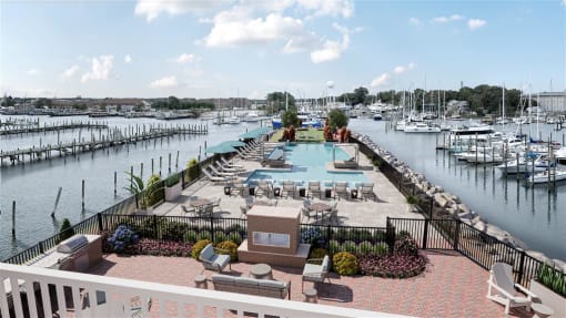a view of a pool and a marina with boats at The Port at East Beach Apartments and Marina, Norkfolk, 23518