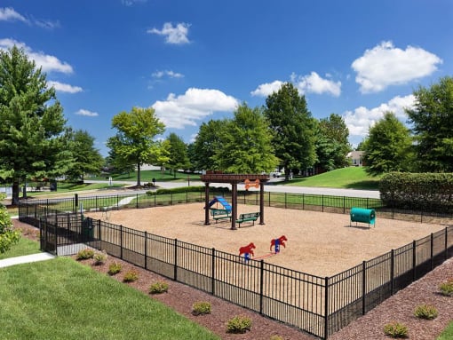 our apartments showcase a beautiful playground at Addison Crater Woods, Petersburg, VA