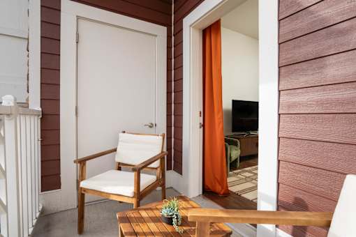 Porch with Wooden Chair at Sundance at Baxter Meadows, Bozeman, MT