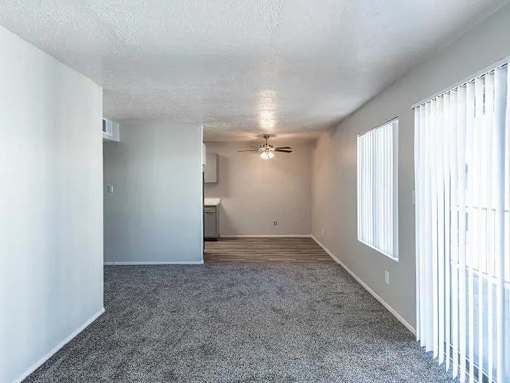 Room with Ceiling Fan at Peaks at Los Ranchos, Albuquerque, 87107