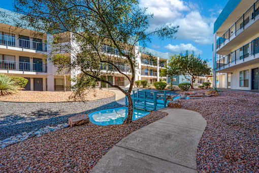 Small Pool surrounded by gravel area at Peaks at Sandia View, Albuquerque, NM, 87102