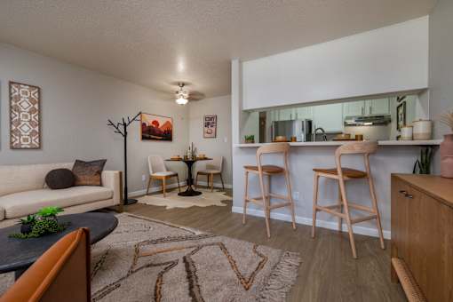 Bright Living Room and Kitchen View at Peaks at Sandia View, Albuquerque, NM