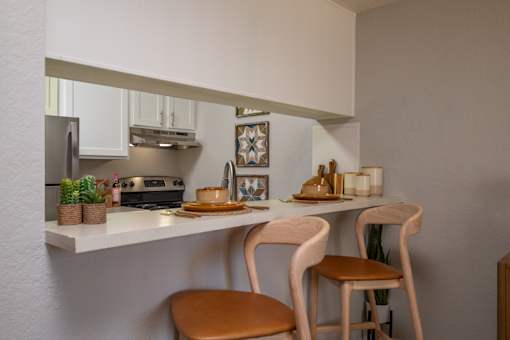 Kitchen with White Counter at Peaks at Sandia View, Albuquerque, New Mexico