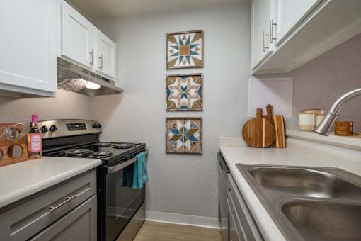 Kitchen with Sink at Peaks at Sandia View, Albuquerque
