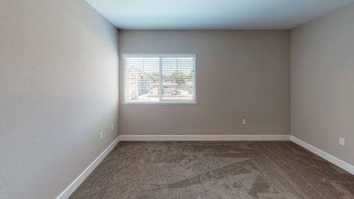 an empty room with a window and carpet at Edgewater, Pittsburg, CA 94565  