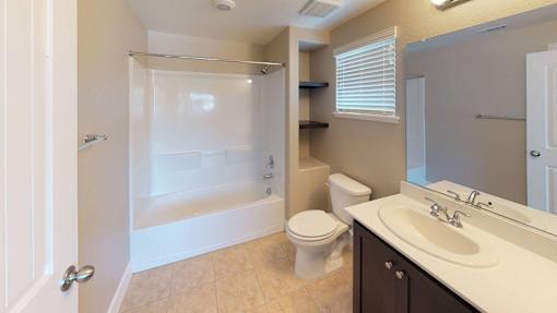 a bathroom with a sink toilet and a shower at Edgewater, Pittsburg, CA  