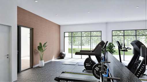 A gym with treadmills and exercise bikes.