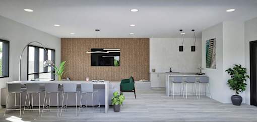 A modern kitchen with a dining table and chairs.