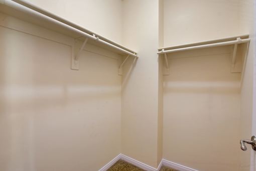 A white door with a silver handle is on the right side of the image.