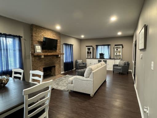 a living room with a couch and a table