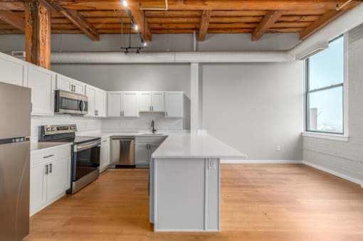 Kitchen with wooden floors at Shorehaus Lofts Apartments, Ohio, 44113