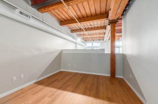 Room with wooden floors at Shorehaus Lofts Apartments, Cleveland