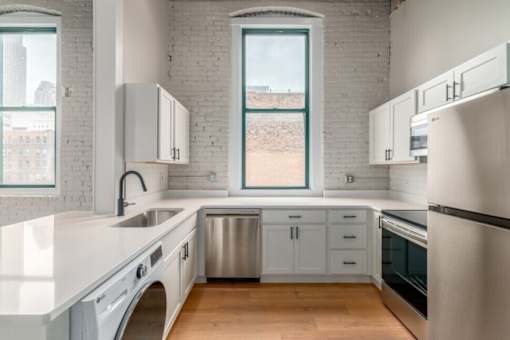 Kitchen with white cabinets at Shorehaus Lofts Apartments, Cleveland, 44113