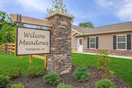 Welcome sign of Wilcox Meadows apartment community.