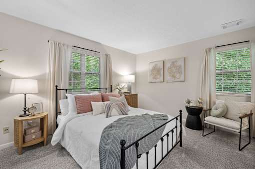 Bedroom with a large bed at Concord Place Apartments, Mentor, 44060