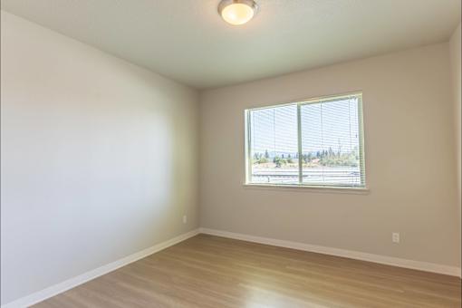 Empty room with a window at Cascade Place Apartment Homes, Molalla, OR, 97038