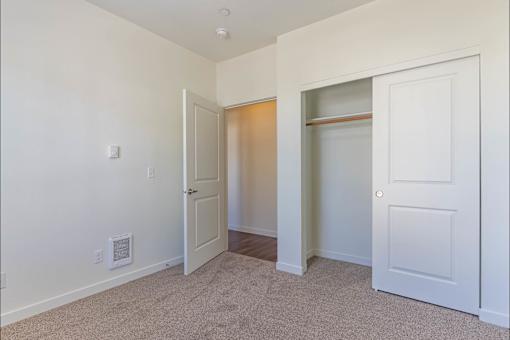 A room with a white door and a window at Riverplace Apartment Homes, Independence, 97351