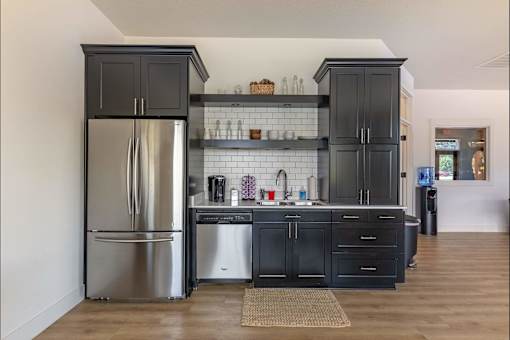 A kitchen with a refrigerator and a dishwasher at Silverplace Apartment Homes, Oregon, 97381