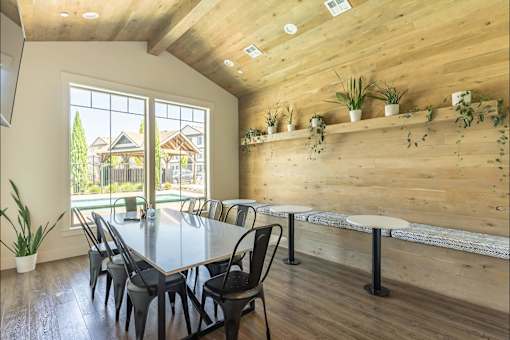 A dining room with a table and chairs at Timberridge Place Apartment Homes, Albany, OR