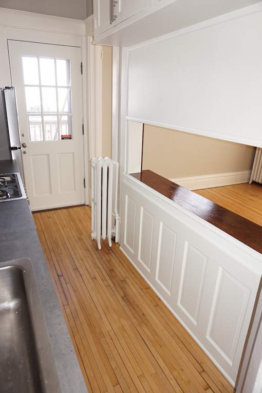 Convenient pass-through opens the kitchen to the living room.