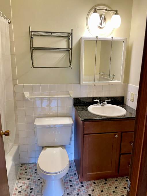 Bathroom with updated fixtures.