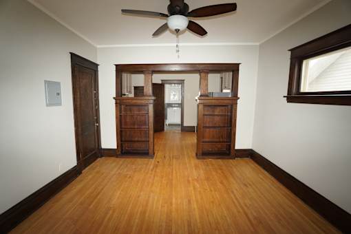 Original oak built-in bookshelves, hardwood floors.