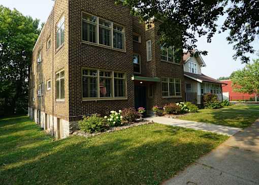 Wooded vacant side lot offers a view of nature.