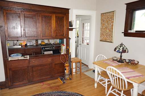 Rear door to private deck - accessible from living room and kitchen.