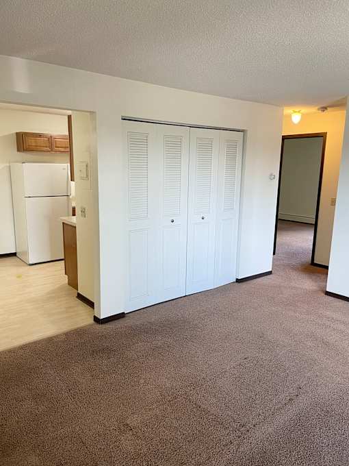 Open floorplan - spacious living room, open to dining area and kitchen.
