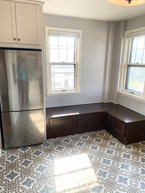 Custom built-in banquet seating in dining area.