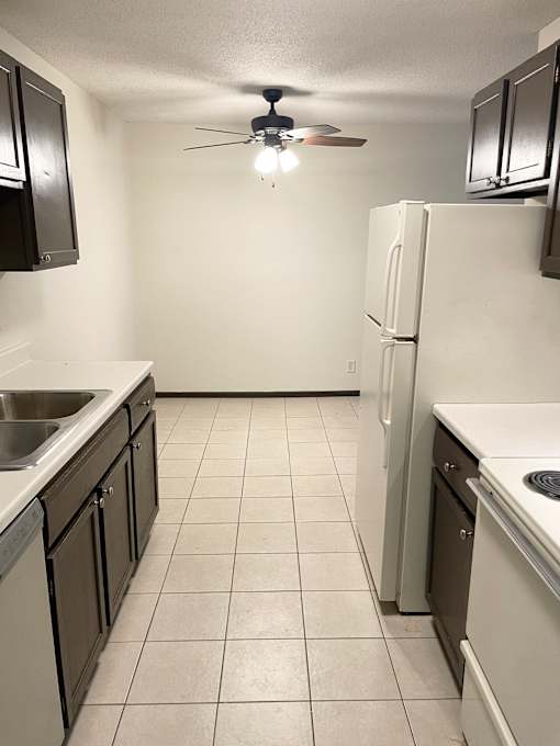 kitchen opens to dining area and living room