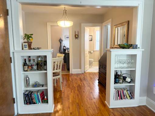 Classic vintage charm - formal dining room, built-in hutch cabinets.