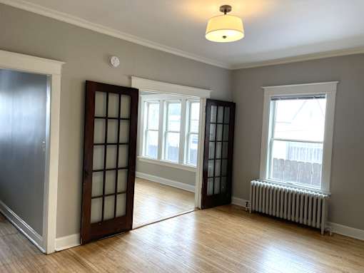 Completely updated unit with original architectural charm.