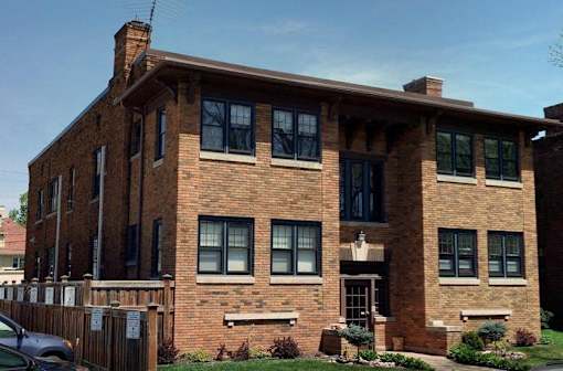 Classic brick building with attractive curb appeal.