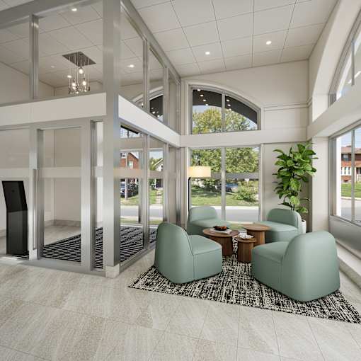 A modern living room with a glass door entrance.