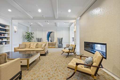 A living room with a television and a couch.