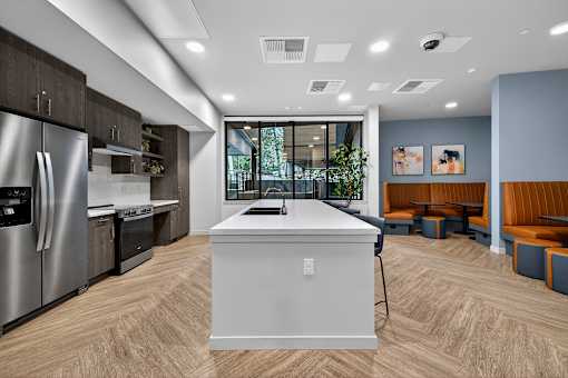 A modern kitchen with a large island in the middle.