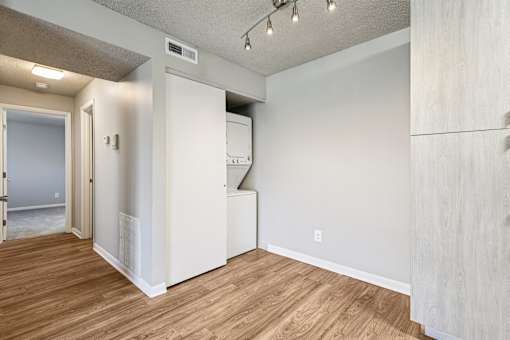 A room with a white door and a white wall  at Grand  Valley Apartments, Milford, OH, 46150