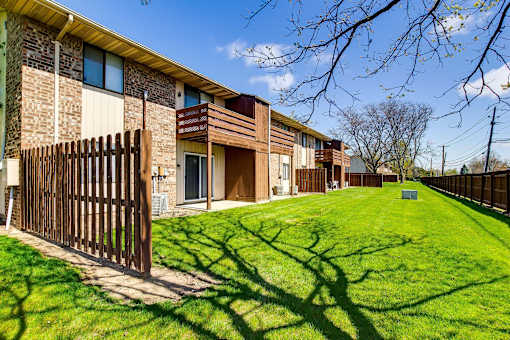 Patio and a privacy fence at Black Hawk Apartments, Fort Wayne, IN, Indiana