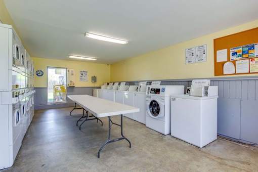 Laundromat with washing machines at Black Hawk Apartments, Fort Wayne, IN, 46815
