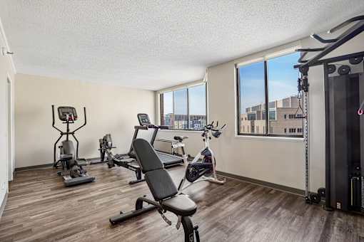 Fitness center with cardio and strength equipment at Irvine Park Towers