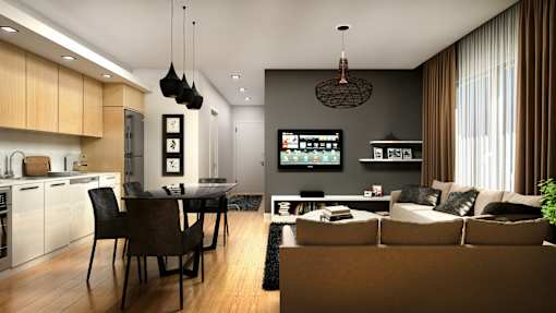 A modern living room with a kitchen area in the background.
