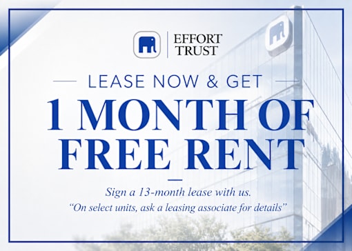 A sign advertising a free month of rent for signing a 13-month lease.