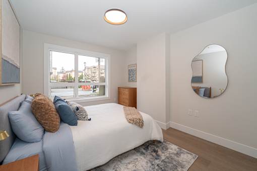 Bedroom with a Window at Woodland Place Apartments, Langford, BC, L4H 3P6
