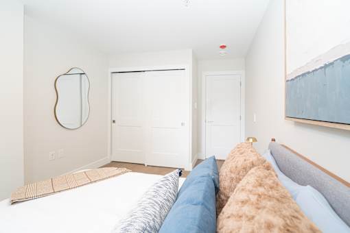 Lavish Bedroom at Woodland Place Apartments, British Columbia