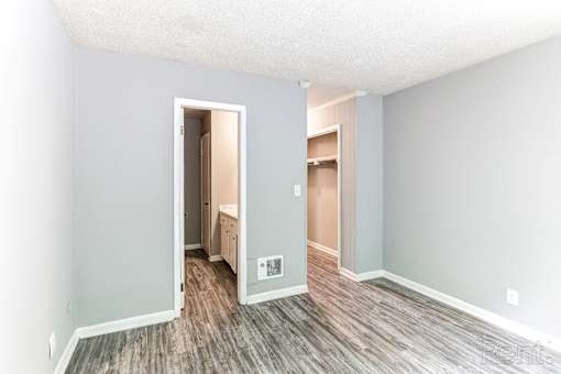 A room with wooden floors.