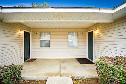 Covered entrance for two residential units.