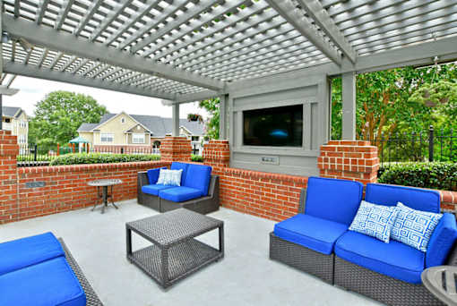 Outdoor Patio With TV at Braxton Woods Lake, Greenville, South Carolina